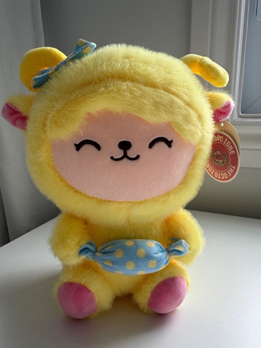 Plush Yellow Lamb Stuffed Animal with Blue Polka Dot Accessory